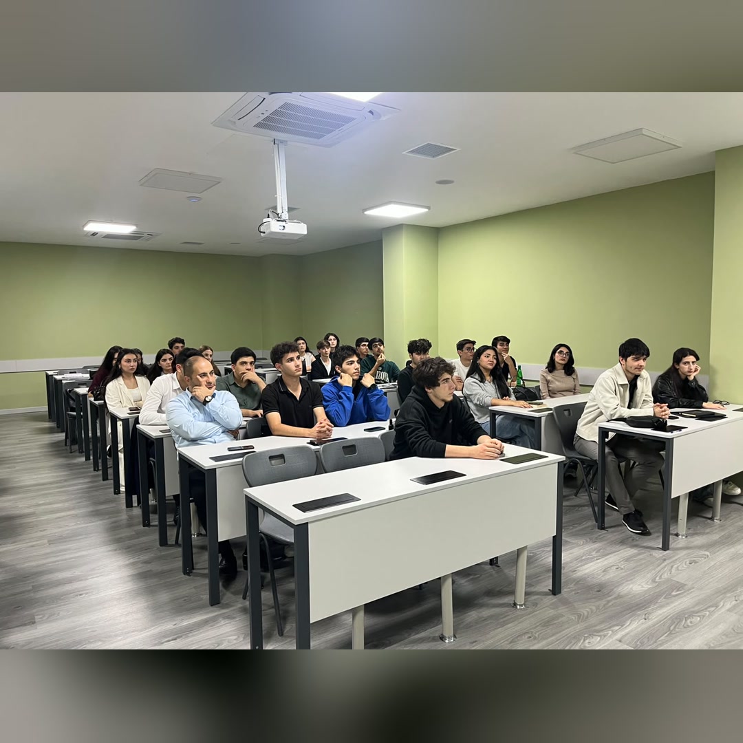 Attendees listening to the trainer during the first session.